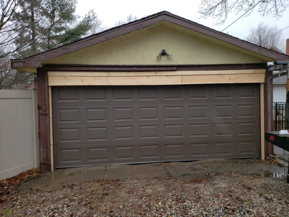 Complete Reframe from (2) Single Car doors to (1) Double Car Opening Residential Installation